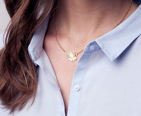 Collier Poo doré et ivoire